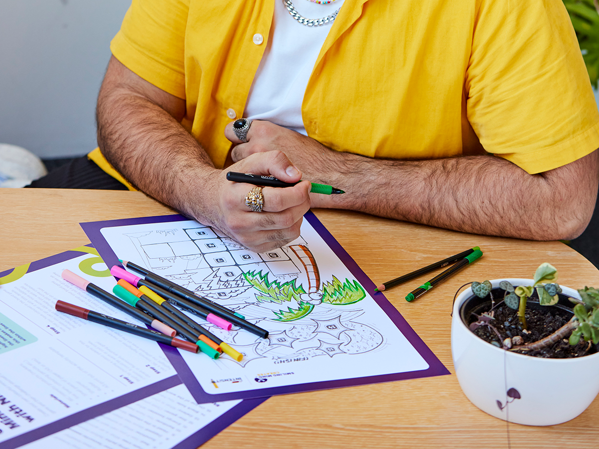 Nick Tsekouras colouring in his activity template